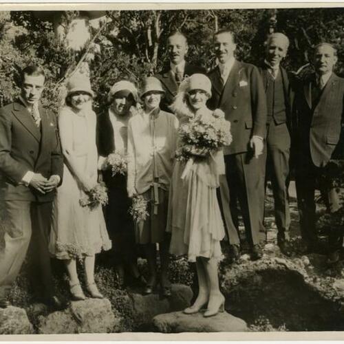 Norma, Margaret, Natalie, and Constance Talmadge (center) with Buster Keaton (left), Joseph M. Schenck (rear, right) and others in background