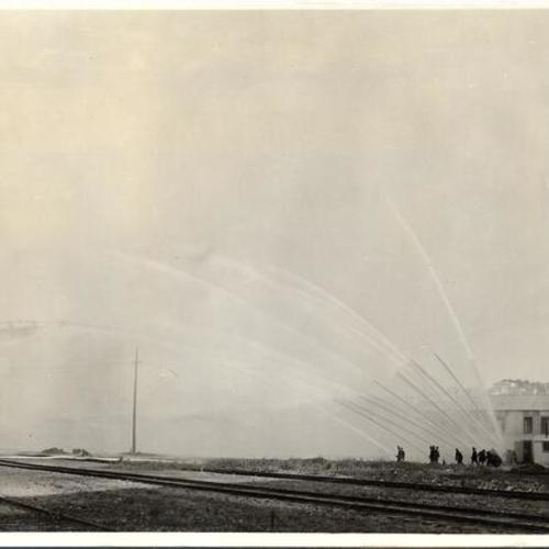 [Fire Department testing equipment near the Panama-Pacific International Exposition]