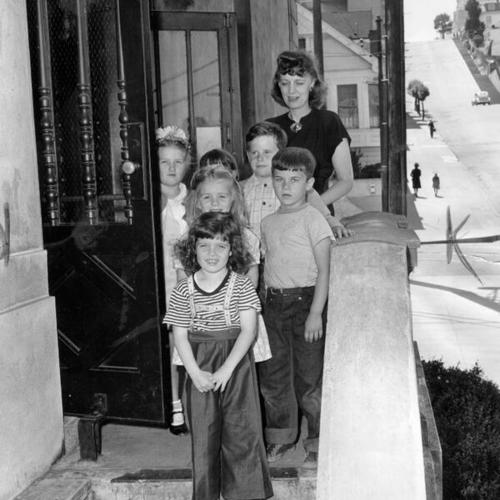 [Miss Audrey Young posing with children from Edison School]