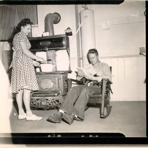 [Two unidentified people in a residence on the Farallon Islands]