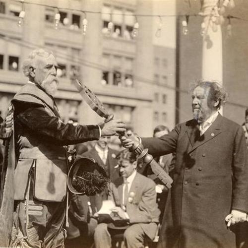 [Mayor Taylor presenting key of city to Don Gaspar de Portola at Union Square, Portola Festival, October 19-23, 1909]
